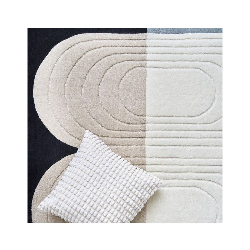 Tapis relief en laine bleu et gris Bibelot detail