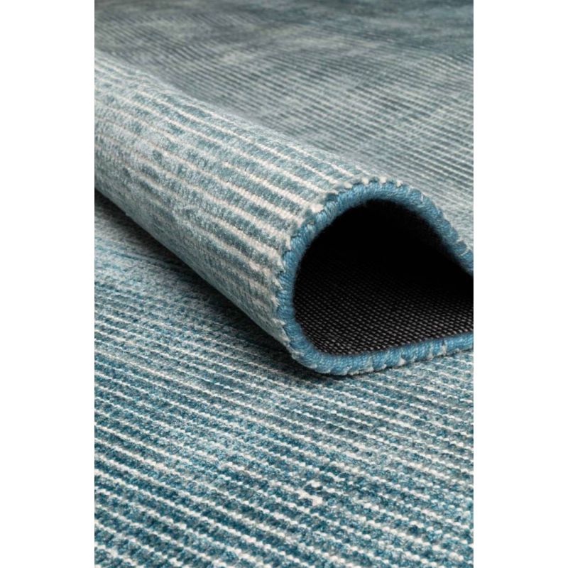 Tapis de salon prestige tissé main en viscose bleu clair Dew