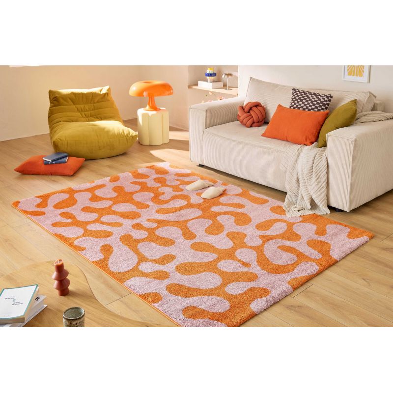 Tapis design seventies rose Brighton salon