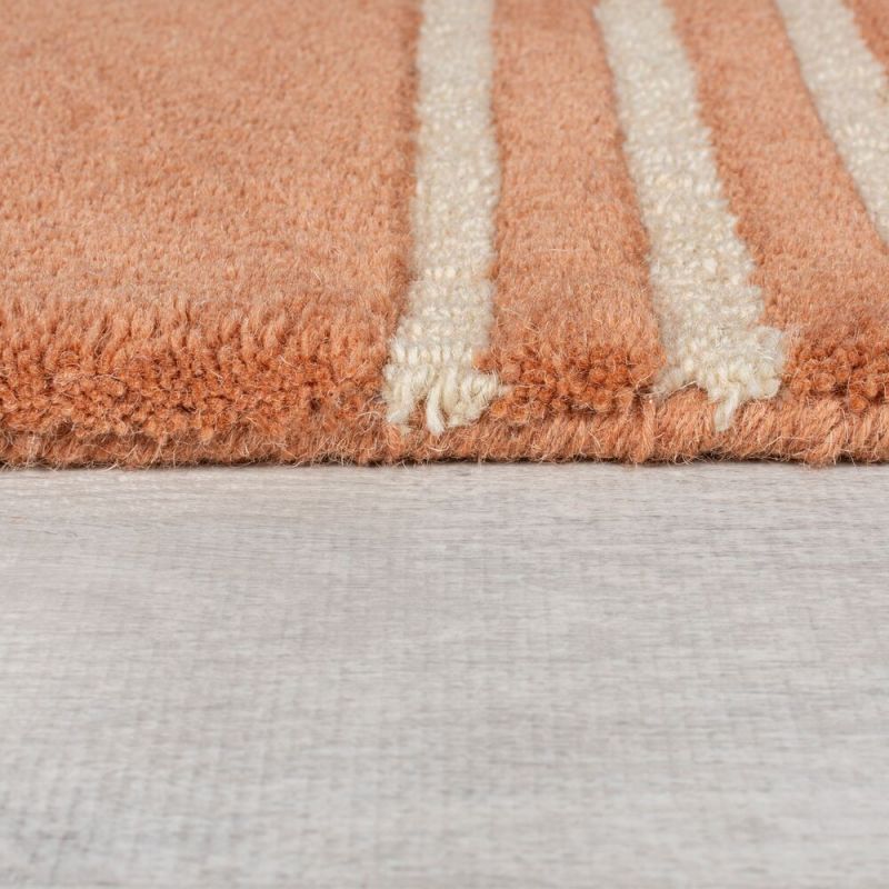 Tapis en laine forme originale terracotta Lozenge détail bordure