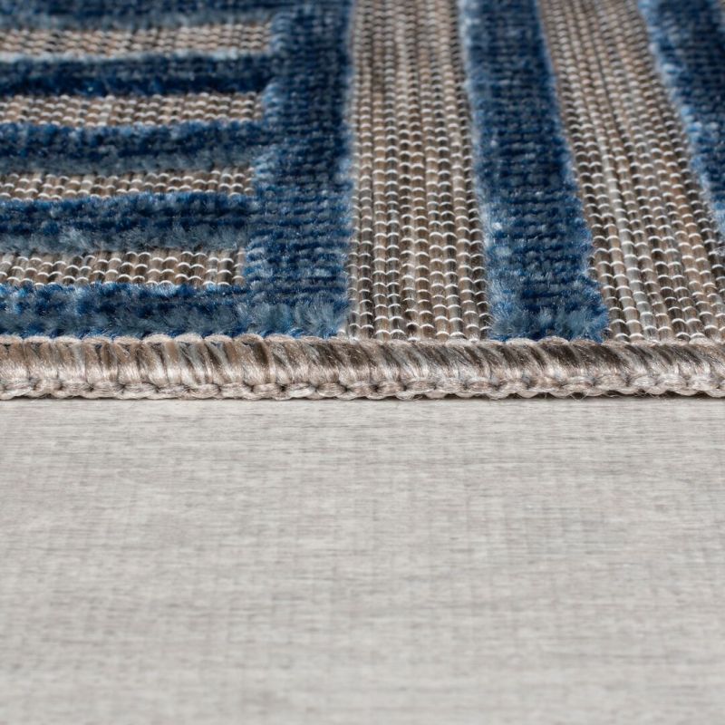 Tapis exterieur motifs géométriques bleus Vigo epaisseur