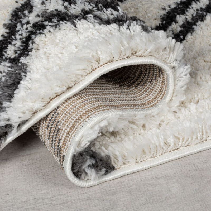 Tapis shaggy épais motifs berberes noir et ivoire Atlas