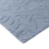 Tapis haut de gamme en laine motif végétal bleu détail angle