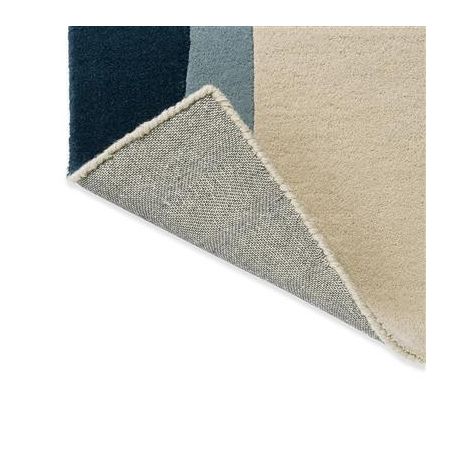 Tapis haut de gamme en laine Torillo bleu Harlequin detail revetement Tapis haut de gamme en laine Torillo bleu Harlequin detail revetement