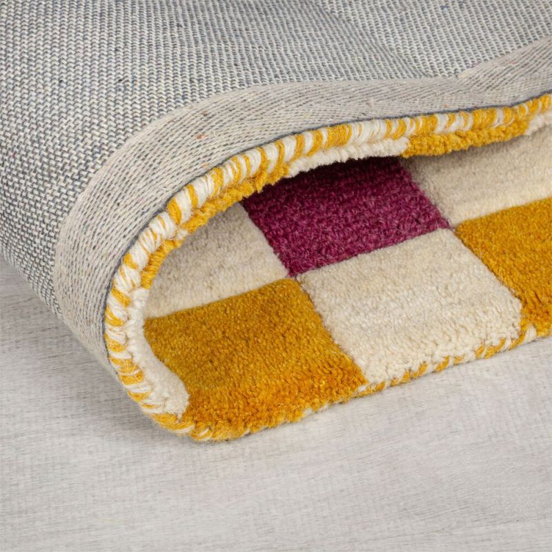 Tapis de salon laine rose et jaune Kai Wool Border revetement