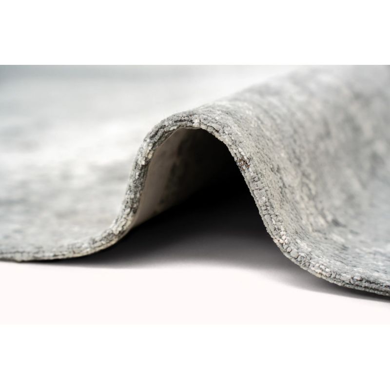 Tapis de Salon rectangulaire haut de gamme Virgin Land Venus gris détail surjet