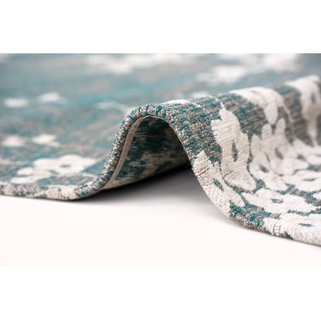 Tapis classique en PET Sakura Lake Blue détail surjet Tapis classique en PET Sakura Lake Blue détail surjet