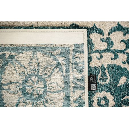 Tapis de salon Suzani Notos beige et bleu canard détail revetement Tapis de salon Suzani Notos beige et bleu canard détail revetement