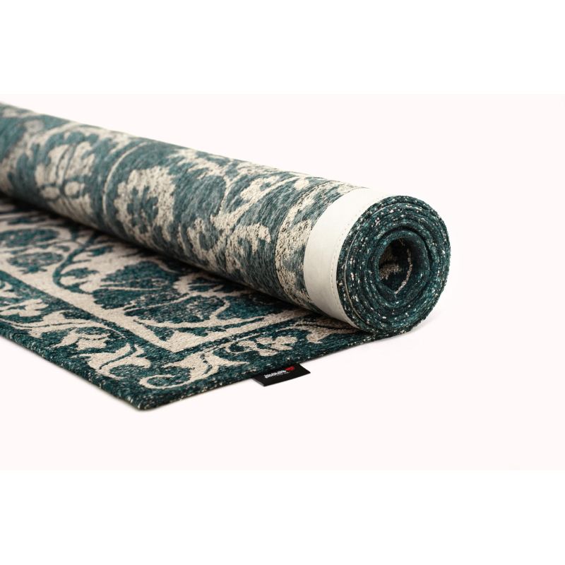 Tapis de salon Suzani Notos beige et bleu canard détail etiquette