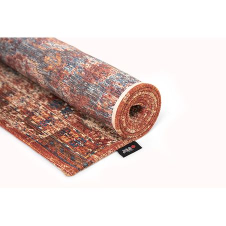 Tapis de salon Kasak Aksou rouge détail etiquette Tapis de salon Kasak Aksou rouge détail etiquette