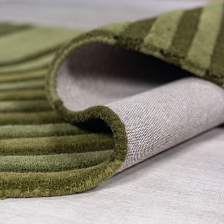 Tapis en laine vert forme originale Conway retro détail revetement