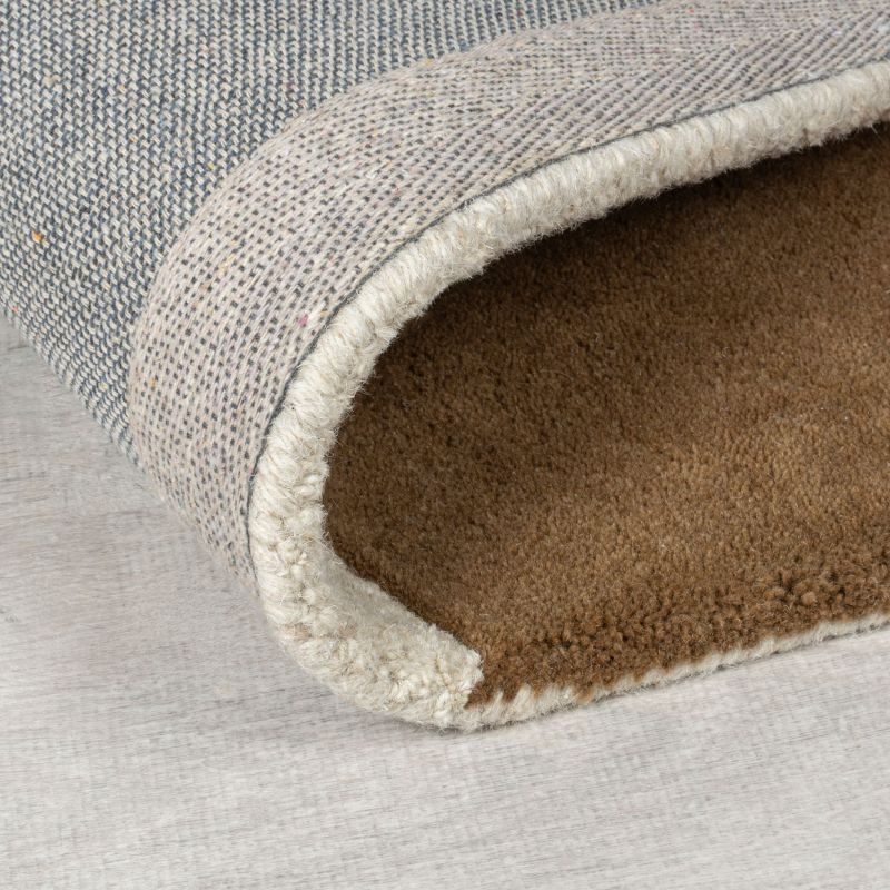 Tapis de salon pure laine beige multi Glow détail revetement