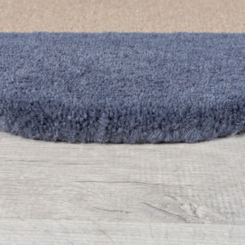 tapis de salon en laine multicolore Abstract Mia Frame détail bordure