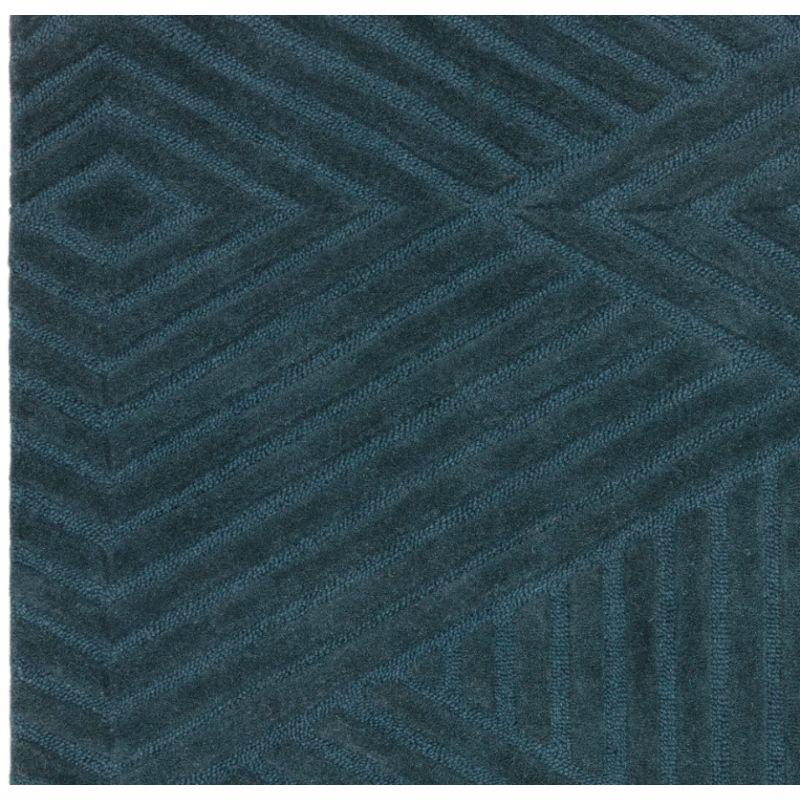 Tapis moderne motifs triangles en relief laine bleu canard Halifax
