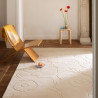 Tapis haut de gamme en laine écru Piirto floral par Marimekko ambiance